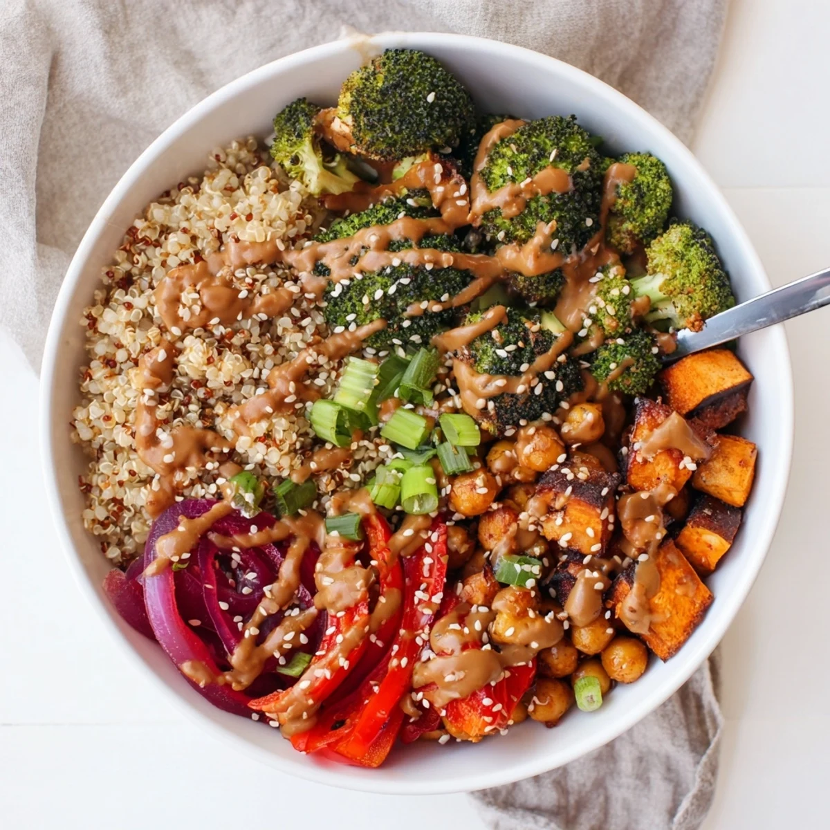 Vibrant Bold Sauce Drizzle Bowls topped with miso-butter and roasted veggies.