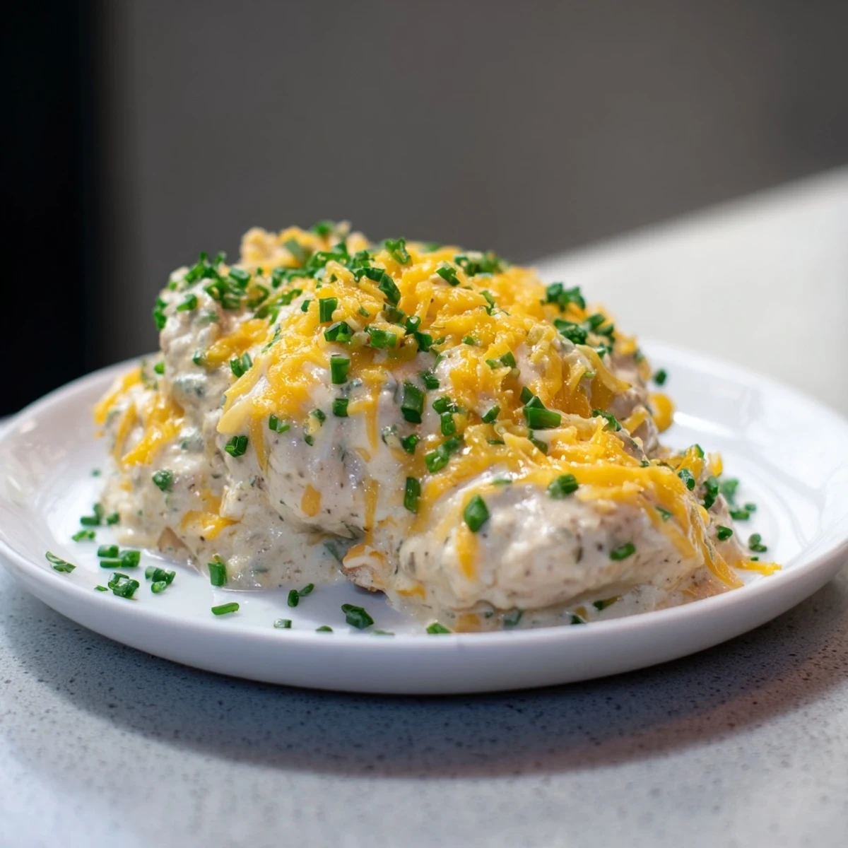 Golden Cheddar Ranch Chicken Bake bubbling with melted cheese, ready to be served hot.