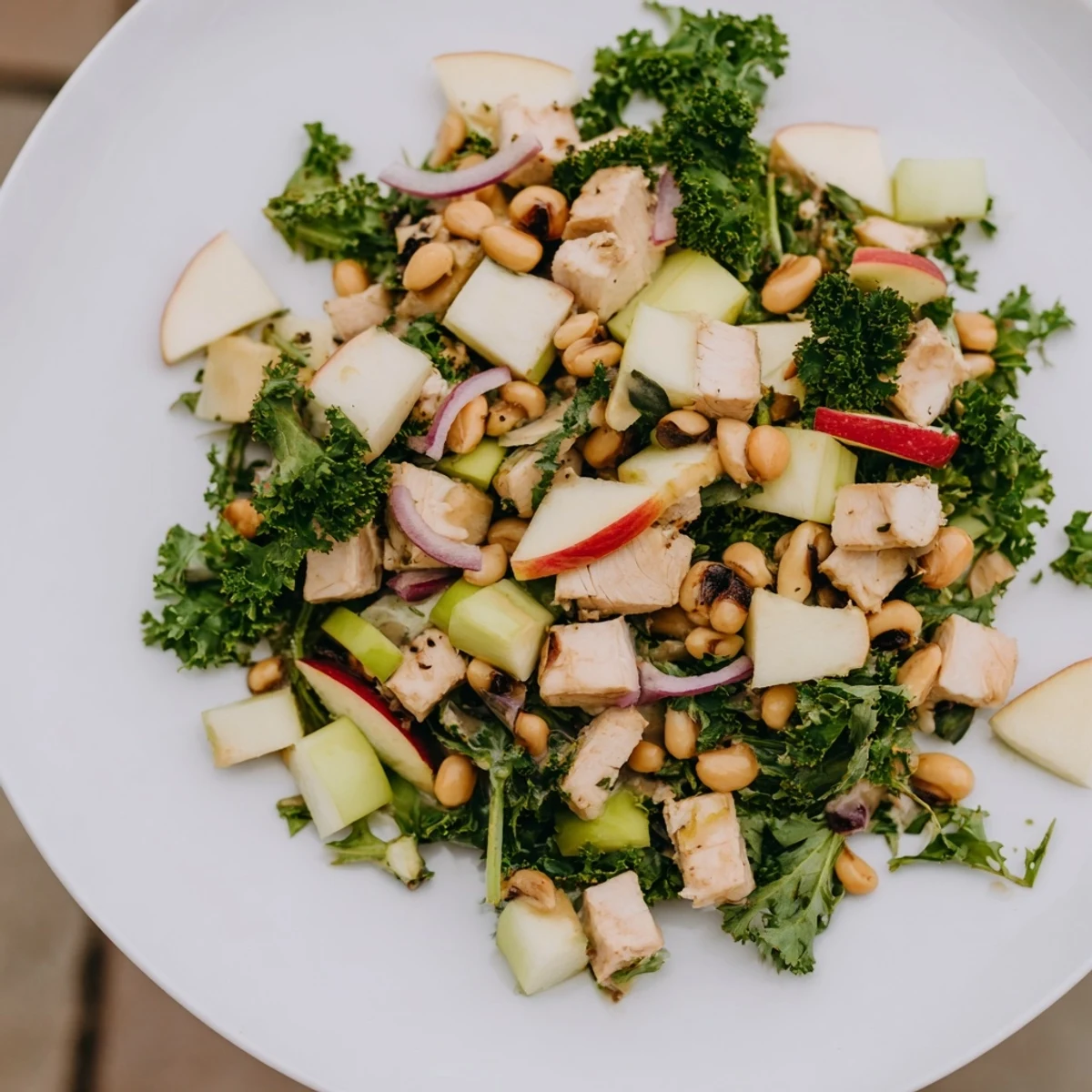 A delicious Chicken and Apple New Years Luck Salad, ready to serve, perfect for New Year's celebrations.
