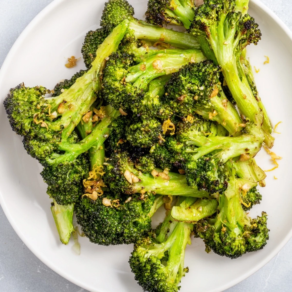 Golden roasted Lemon Garlic Broccoli, glistening with lemon juice, is a flavorful, healthy side.