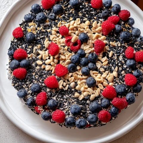 Colorful Singing Bird Seed & Berry Platter, a delightful outdoor treat for hungry songbirds to enjoy.