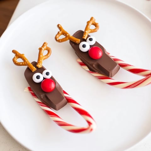 Delicious Rudolph Candy Cane Sleds, a festive treat with candy cane runners and chocolate base.