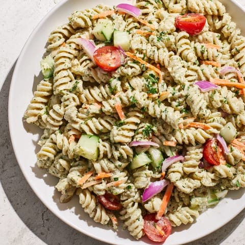 Cool, refreshing Vegan Hemp Seed Ranch Pasta Salad featuring colorful vegetables and a rich hemp seed dressing.