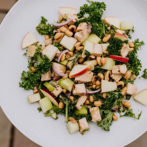 A delicious Chicken and Apple New Years Luck Salad, ready to serve, perfect for New Year's celebrations.
