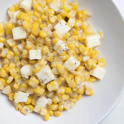 Warm Honey Butter Skillet Corn garnished with melted butter, perfect for a flavorful side dish.
