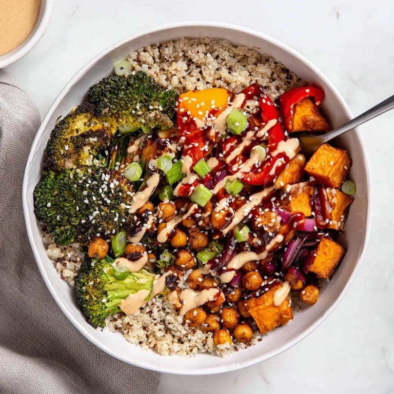 Colorful bowls of grains and roasted vegetables drizzled with gochujang-maple sauce.