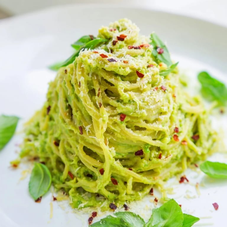 The bright green Smashed Avocado Pasta dish is a quick and easy vegetarian dinner, flavorful!