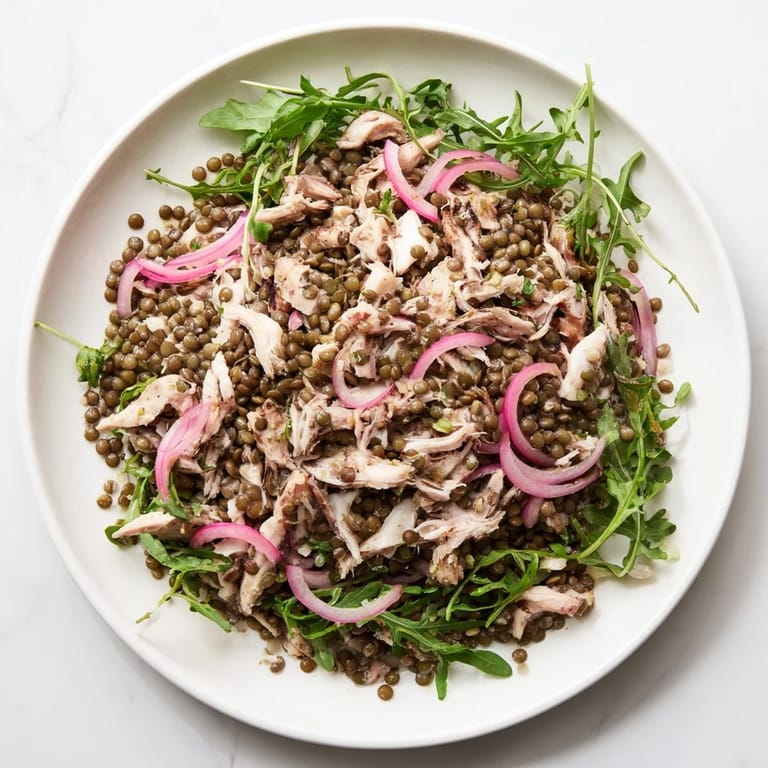 Healthy Lentil & Chicken Spring Salad plated with tender lentils, shredded chicken, and a light mustard dressing, perfect for a refreshing high-protein lunch.